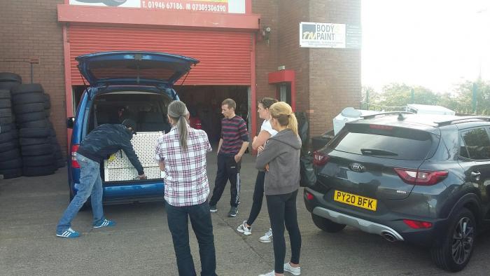 Course participants learn how to safely load a wheelchair